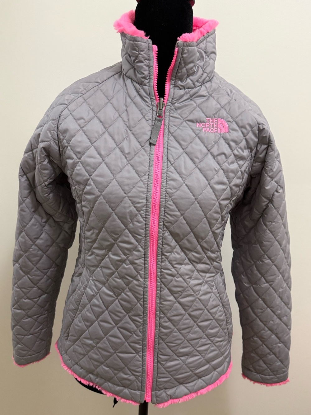 The North Face Girls Gray Quilted Reversible Jacket with Pink Fur Interior
